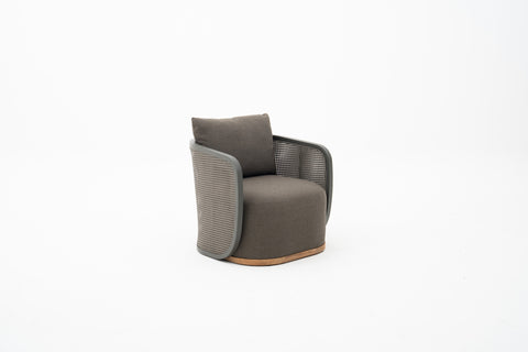 Wicker Weave Outdoor Lounge Chair with textured backrest & mahogany wood base